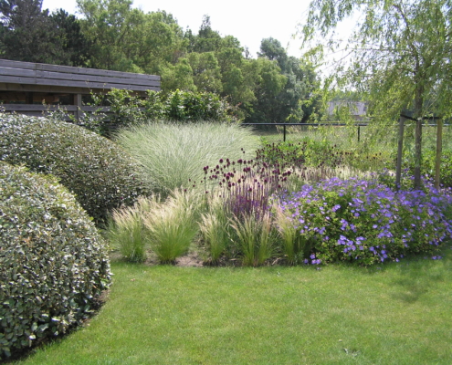 exclusieve tuin met borders en bomen